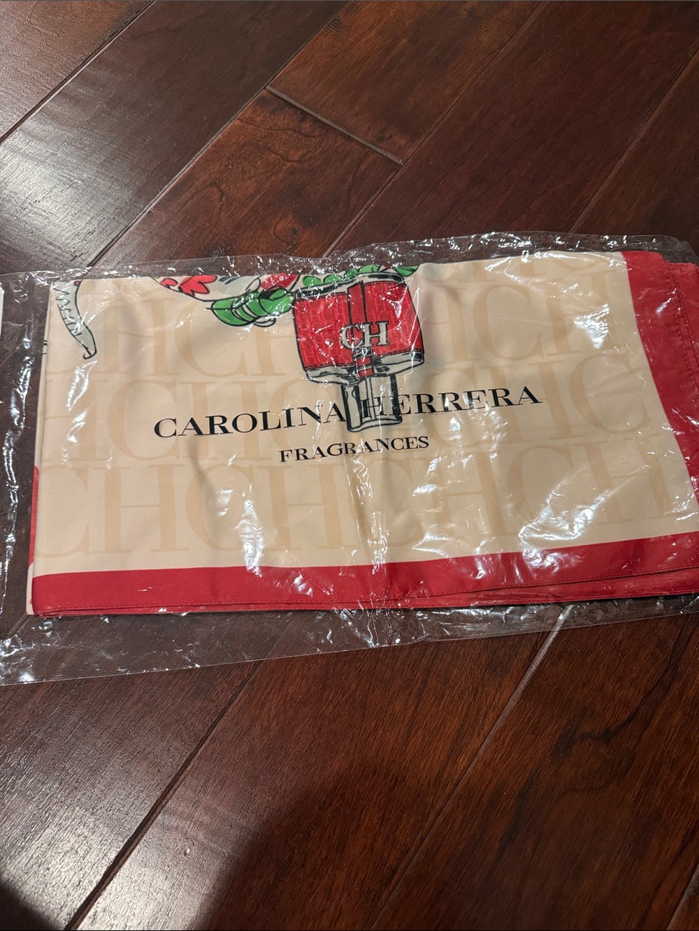 NWT Carolina Herrera Silk Logo Scarf in cream with red trim and elephant